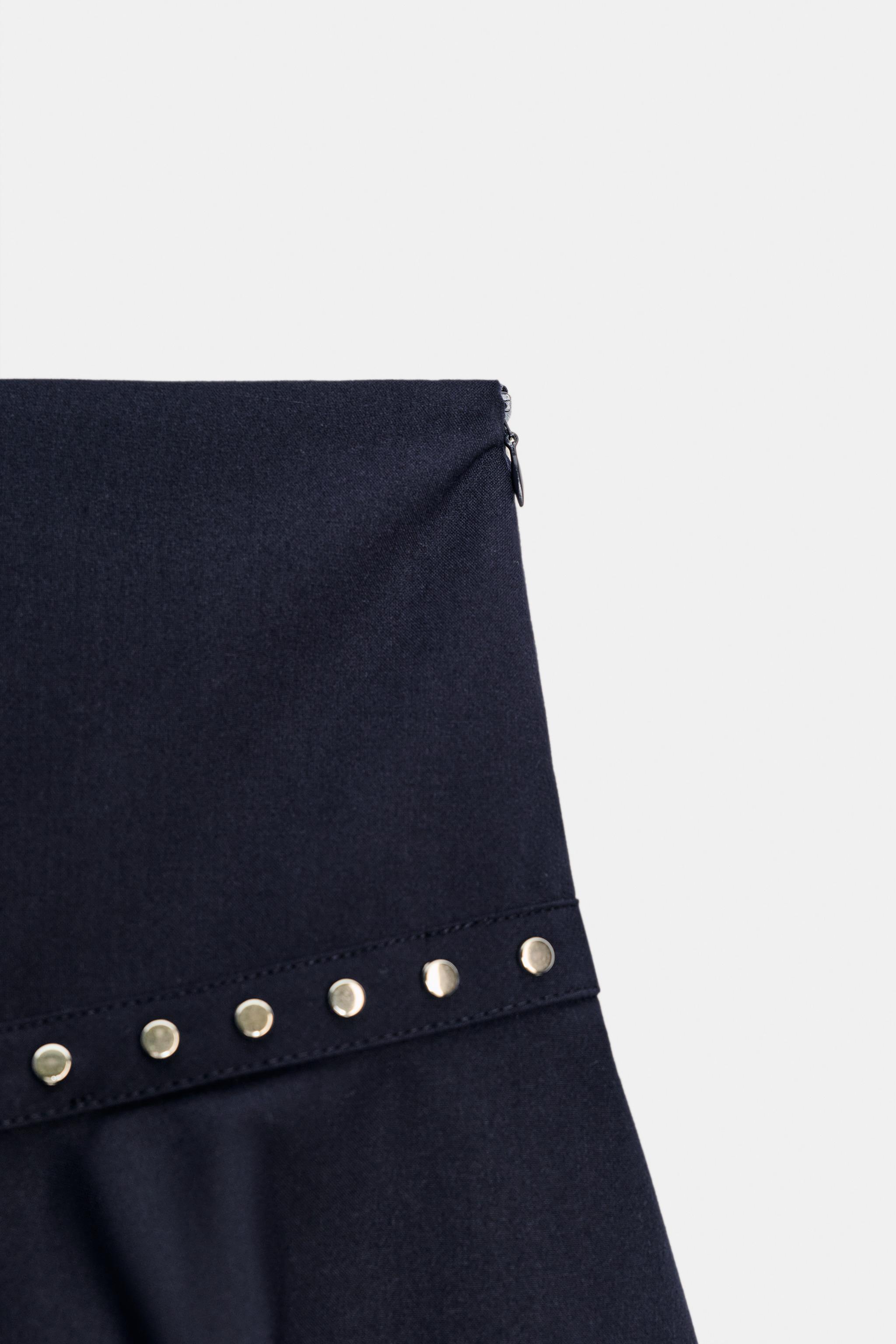 ASYMMETRIC RUFFLE STUD SKIRT